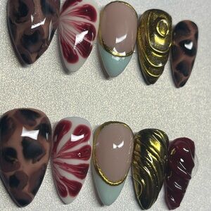 Elegant Nail Art Set with Gold and Red Accents
